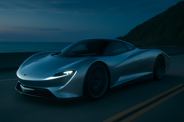 McLaren Speedtail on a coastal highway at dusk