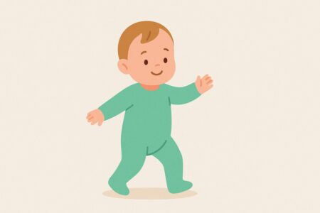 Baby taking first steps in green onesie with walking age range shown.