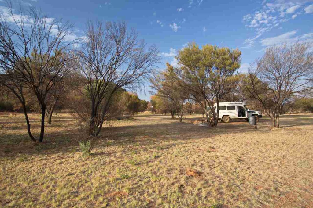 Camping for First Timers: How to Pick the Perfect First Site Scenic beginner-friendly campsite with tent near lake at sunset