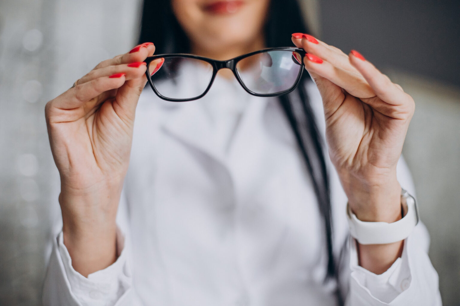 People wearing different styles of prescription eyeglasses in lifestyle settings