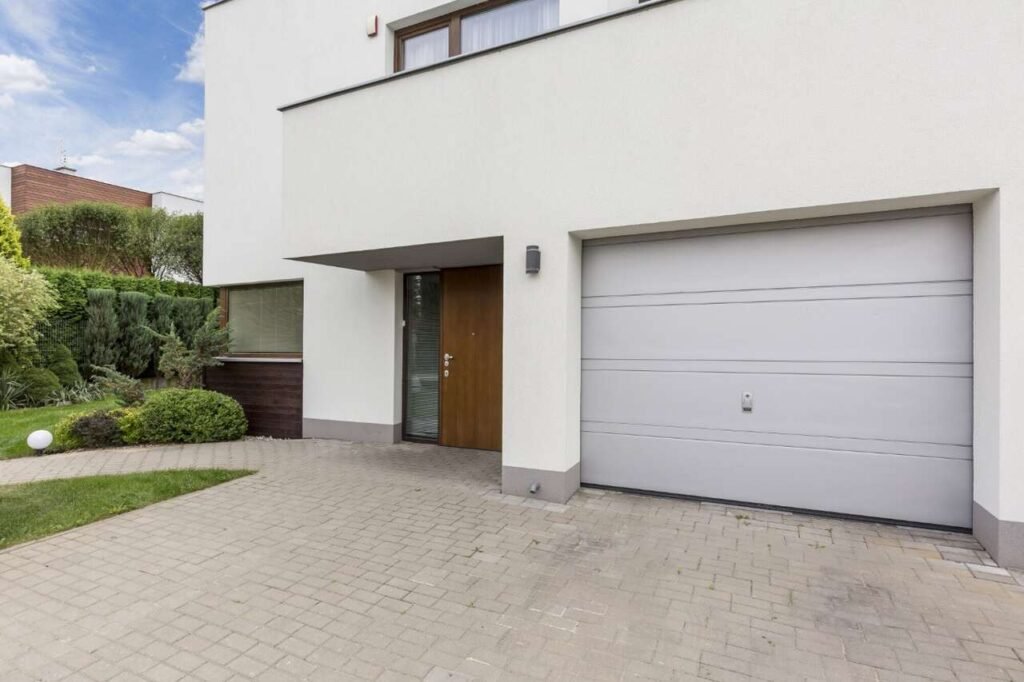 How to Choose the Perfect Garage Door for Your New Home Modern garage door for a new home