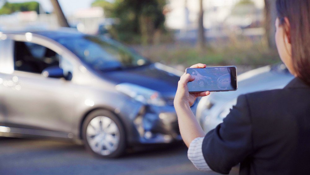 How to Tell If Your Car Has Hidden Damage After an Accident Car being inspected for hidden damage after an accident